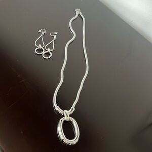 Diane Von Furstenberg silver toned costume jewelry set